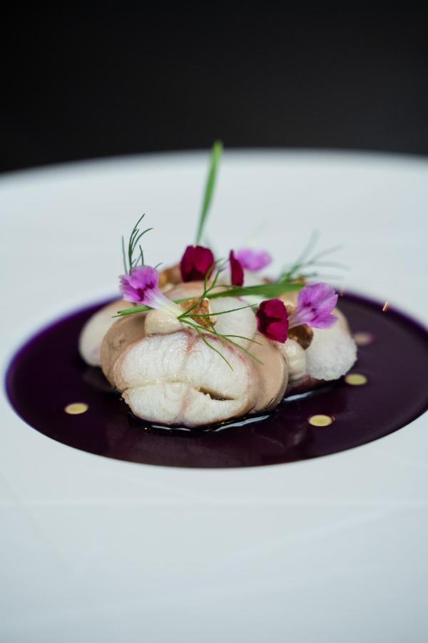 Het Arresthuis Roermond Exterior photo A dish of monkfish